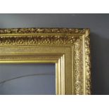 A 19TH CENTURY DECORATIVE GOLD FRAME WITH ACANTHUS LEAF DESIGN TO OUTER EDGE, frame W 12 cm, frame