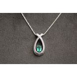 AN EMERALD AND DIAMOND PENDANT ON 14k WHITE GOLD CHAIN, pendant stamped 14k CEI, H 1.25 cm approx