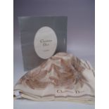 A VINTAGE CHRISTIAN DIOR SILK SCARF, neutral tones with palm tree style pattern, approximately 68