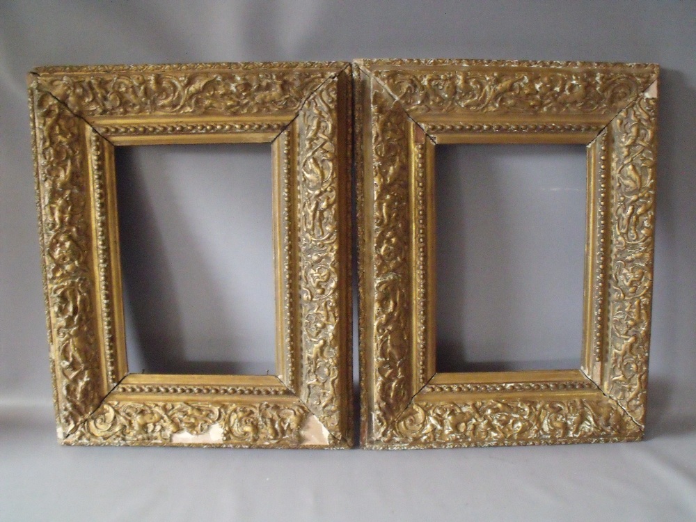 A PAIR OF LATE 18TH / EARLY 19TH CENTURY DECORATIVE GOLD FRAMES A/F, decorated with various