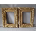 A PAIR OF LATE 18TH / EARLY 19TH CENTURY DECORATIVE GOLD FRAMES A/F, decorated with various