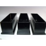 DAVID LINLEY OF LONDON -THREE RECTANGULAR EBONY CONTAINERS, W 36 cm, D 12 cm, H 12 cm (3)Condition