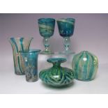 A COLLECTION OF MDINA BLUE STUDIO GLASS, comprising four various style vases and two goblets, some