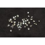 A PARCEL OF 4.93ct MIXED, LOOSE, RBC AND ROUND-CUT DIAMONDS