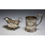 A CONTINENTAL SILVER TANKARD, stamped 875, together with a hallmarked silver sauce boat - Chester