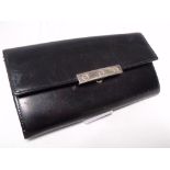 A CARTIER OF PARIS BLACK LEATHER LADIES WALLET, subtle textured effect finish, note compartment, zip