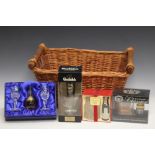 4 WHISKY MINIATURE GIFT PACKS TO INCLUDE LAGAVULIN 16 YEARS OLD, in a wicker basket