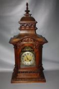 A LARGE AND IMPRESSIVE LATE 19/EARLY 20TH CENTURY WALNUT MANTEL CLOCK BY GUSTAV BECKER, the well