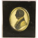 (XIX). Oval portrait miniature of a gentleman in black jacket and white stock, silhouette verso,
