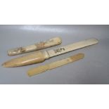 A 19TH CENTURY CHINESE IVORY PAGE TURNER, the blade with engraved 'MR' monogram and crest, L 38