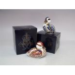 TWO ROYAL CROWN DERBY 'SWIMMING DUCKLING' PAPERWEIGHTS, both with gold stopper and boxed, tallest