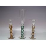 A PAIR OF MODERN STUDIO / ART GLASS CANDLESTICKS, engraved AM 2003, together with a similar style