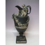 A RESTORED WEDGWOOD BLACK BASALT 'SACRED TO NEPTUNE' WATER EWER, modelled by John Flaxman Sen. (1726