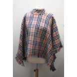 A VINTAGE BURBERRY CAPE / PONCHO, with fringe detailing to bottom edge, one size