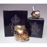 A ROYAL CROWN DERBY 'OWL' PAPERWEIGHT, together with a Derby Wren, both gold stoppers and boxed (2)
