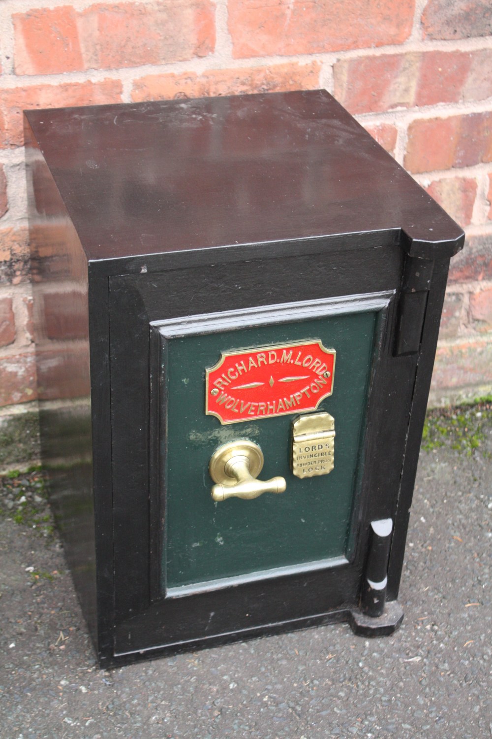A SMALL CAST SAFE BY RICHARD M LORD - WOLVERHAMPTON, with key, H 57 cm, W 36 cm