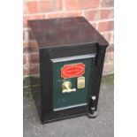 A SMALL CAST SAFE BY RICHARD M LORD - WOLVERHAMPTON, with key, H 57 cm, W 36 cm