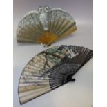 A VINTAGE EBONISED FOLDING FAN WITH HAND PAINTED EMBELLISHMENT, L 20.5 cm, together with a smaller