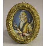 (XIX). Indian school, oval portrait miniature of a Sultan with bow and arrow, unsigned, mixed