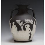 A WEDGWOOD BLACK JASPERWARE PORTLAND VASE, A/f H 25.5 cmCondition Report:some relief missing, see