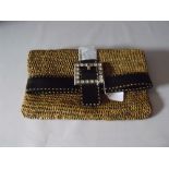 A MICHAEL KORS RAFFIA FOLD OVER CLUTCH BAG, basket weave effect, black leather band to top edge with