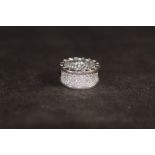 A BVLGARI 18 CARAT WHITE GOLD DIAMOND PAVE SET RING, set with an estimated 2.3 carats of brilliant