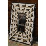 AN ART DECO STYLE TROMPE L'OEIL MARBLE FRAMED MIRROR, H 102 cm by W 74 cm