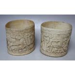 A NEAR PAIR OF 19TH CENTURY CHINESE CARVED IVORY TUSK SLEEVES, each with carved figures and