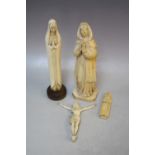 A COLLECTION OF FOUR ASSORTED CARVED IVORY FIGURES, to include a Corpus Christi, nun, etc. (4)