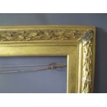 A 19TH CENTURY GILT FRAME WITH ACANTHUS LEAF DESIGN TO EDGE AND GOLD SLIP, frame W 7 cm, frame