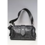 A VIVIENNE WESTWOOD EMBOSSED BLACK LEATHER HANDBAG, flat leather handle, over-sized zip fastening,