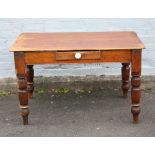 A VICTORIAN PINE SCRUB TOP KITCHEN TABLE, with single frieze drawer, raised on turned supports, H 72