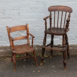 A SMALL ANTIQUE TRADITIONAL CHILDS ELM HIGH CHAIR, with turned supports and spindles, H 85 cm, S/