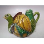 AN UNUSUAL SMALL MAJOLICA TEAPOT, the spout in the form of a mythical winged beast, W 15.5 cm S/D