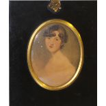(XIX). Oval portrait miniature of a young lady, unsigned, watercolour on paper, framed and glazed,