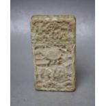 A 19TH CENTURY CHINESE CANTON CARVED IVORY SMALLER CARD CASE, typically decorated with figures and