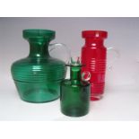 A RIIHIMAEN LASI KLEOPATRA GREEN GLASS JUG, with clear glass loop handle, designed by Tamara Aladin,