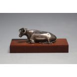 A HALLMARKED SILVER MODEL OF A COW - SHEFFIELD 1836, on later wooden plinth, W 9.5 cm