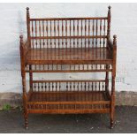 AN UNUSUAL ANTIQUE OAK BUFFET WITH TURNED SPINDLE DECORATION, of two tier construction with turned