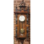 A 19TH CENTURY MAHOGANY VIENNA WALLCLOCK, with rearing horse surmount, the enamel dial with Roman