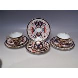 THREE ROYAL CROWN DERBY TRIOS, pattern no. 5683, varying dates to backstamps