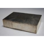 A CONTINENTAL SILVER CIGARETTE BOX, stamped 875, approx weight 375g, W 16 cm