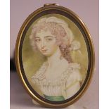(XIX). Oval portrait miniature of a young lady in a white dress, unsigned, framed and glazed, 8 x