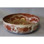 A LARGE JAPANESE KATANI BOWL, decorated in red and gold, with a floral pattern to the outside, to