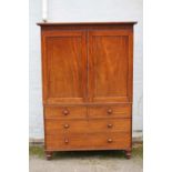 A GEORGIAN MAHOGANY LINEN PRESS, the twin door upper section opening to five fitted linen shelves,