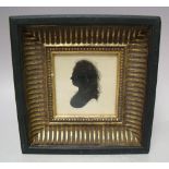 J.M. Silhouette miniature of a Georgian lady, signed with initials and dated 1830 lower middle to