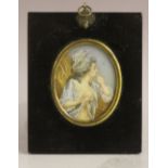 J.K (XIX-XX). French school, oval portrait miniature of a lady with left breast exposed, signed