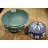 A TEAL WEDGWOOD JASPERWARE BOWL, TOGETHER WITH A NAVY BLUE LIDDED POT (2)