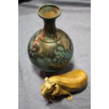 AN ORIENTAL BRASS FIGURE OF A RAT WITH A BAG TOGETHER WITH AN ORIENTAL METAL VASE WITH CHARACTER