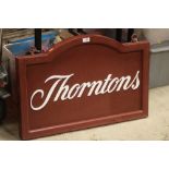 A MODERN DOUBLE SIDED THORNTON'S CHOCOLATE ADVERTISING SHOP SIGN
